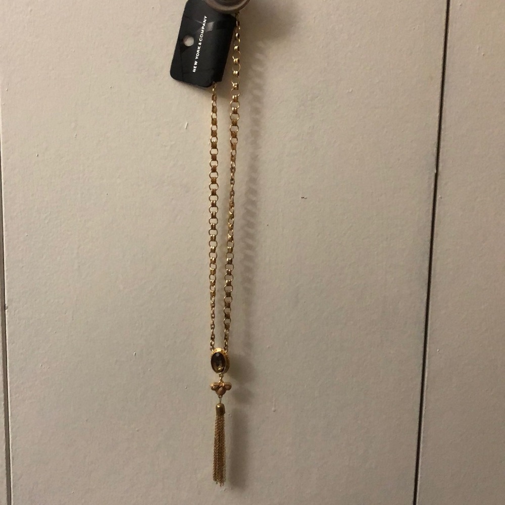 Long gold necklace